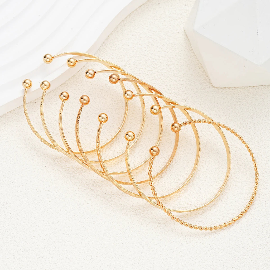 Set 7 Bracciali Dorati Donna — Stile Punk Boho con Cuori e Design Aperto