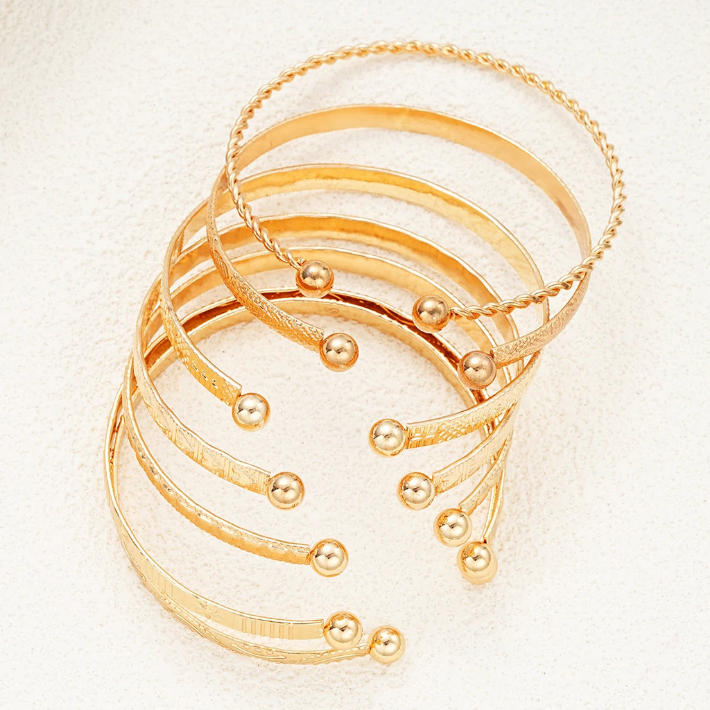 Set 7 Bracciali Dorati Donna — Stile Punk Boho con Cuori e Design Aperto